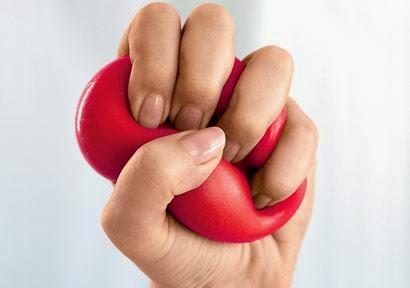 woman-hand-squeezing-stress-ball-410x290_0.jpg