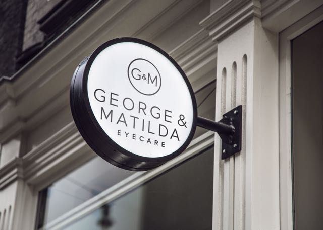 GM-Hanging-Wall-Sign (1).jpg
