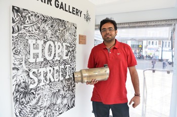 7062-Inventor_Anirudh_Sharma_pictured_with_his_Air_Ink_technology_inside_the_Tiger_Beer_Clean_Air_Gallery_in_Brixton_London_.JPG.350x0.jpg