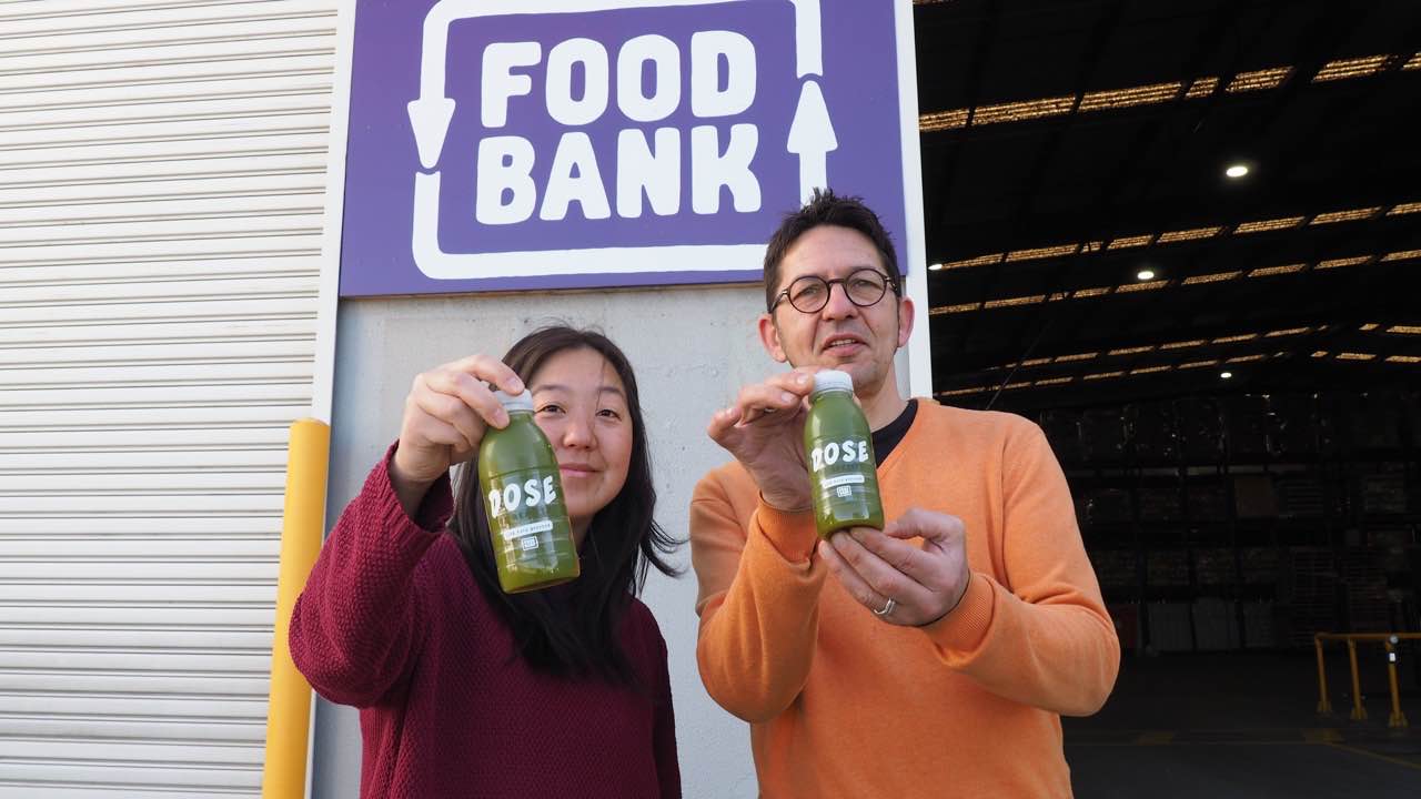 The Foodbank team in Victoria pose with Dose (1).jpg
