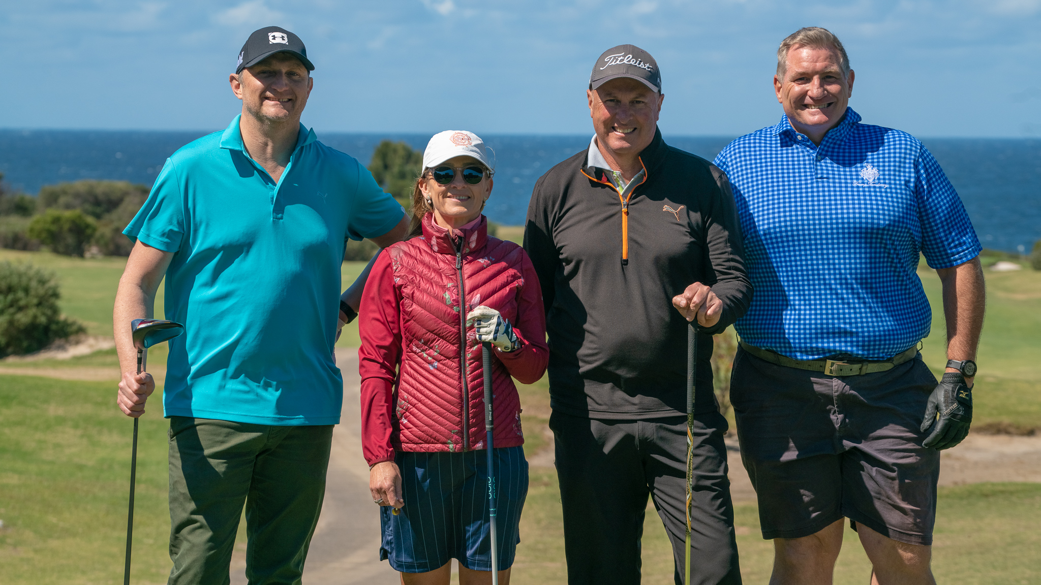 Industry swings for good at UnLtd Open golf tournament; ACM takes home the inaugural cup
