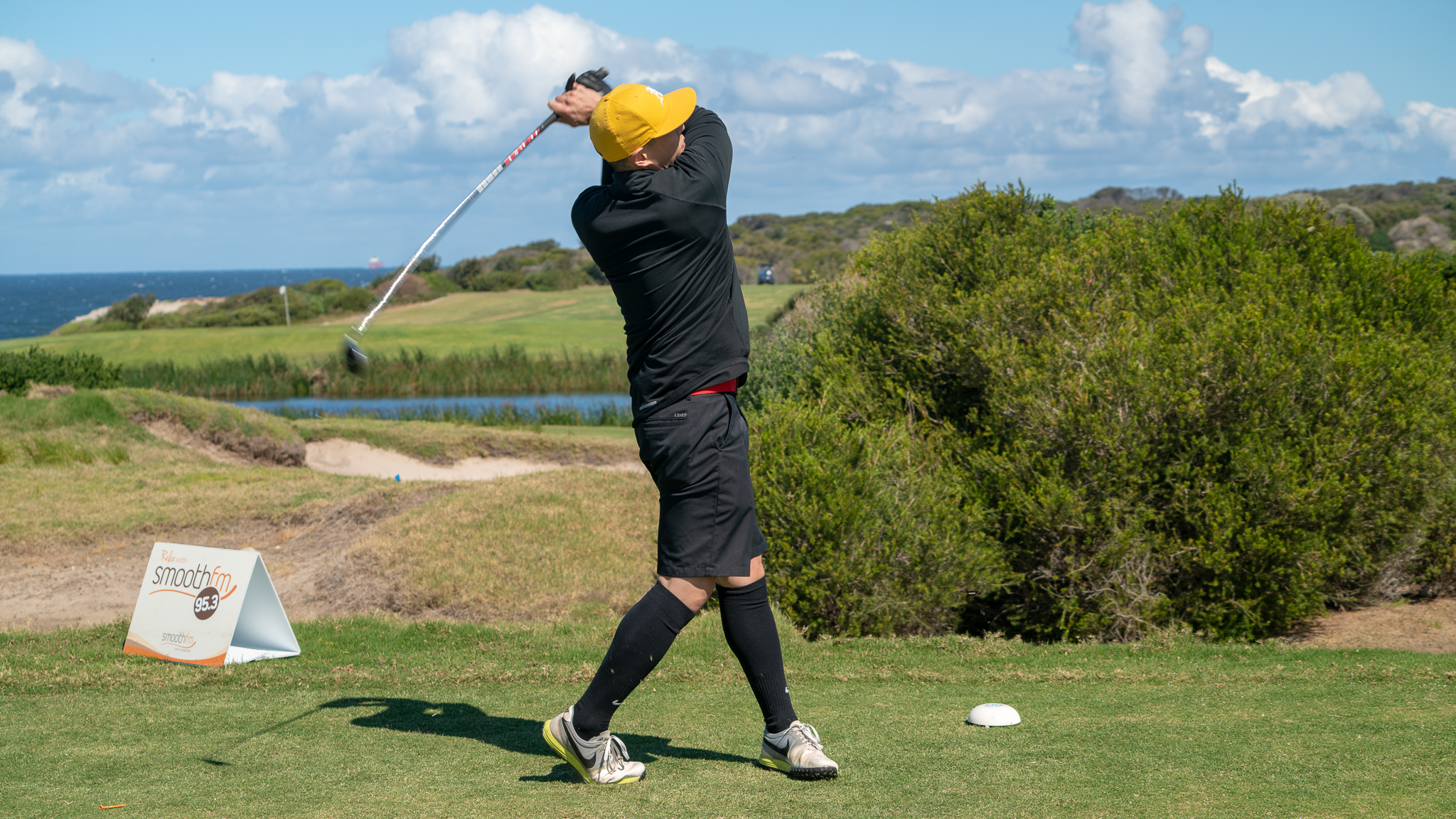 Industry swings for good at UnLtd Open golf tournament; ACM takes home the inaugural cup