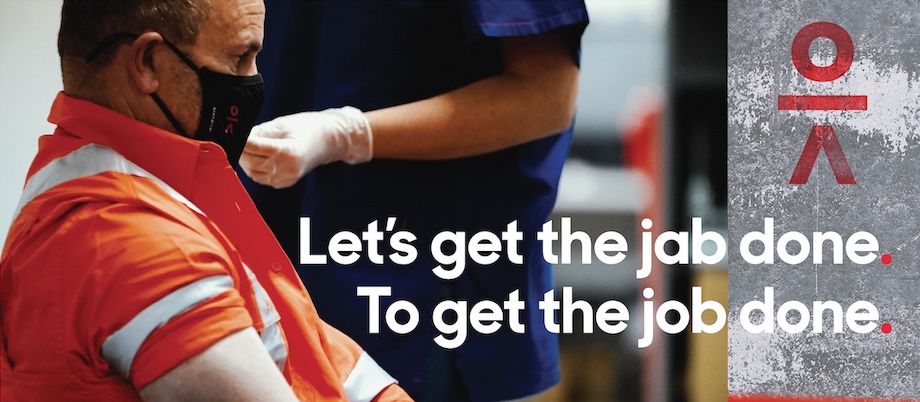 John Holland says “Let’s get the jab done to get the job done” in new campaign via hellofuture.tv