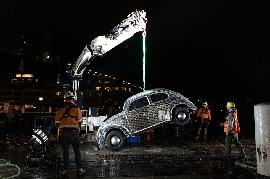 Uber Carshare suspends a giant disco ball car over Sydney Harbour in new stunt via Herd MSL