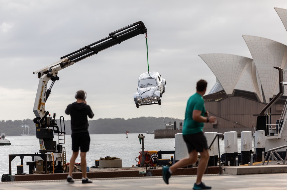 Uber Carshare suspends a giant disco ball car over Sydney Harbour in new stunt via Herd MSL