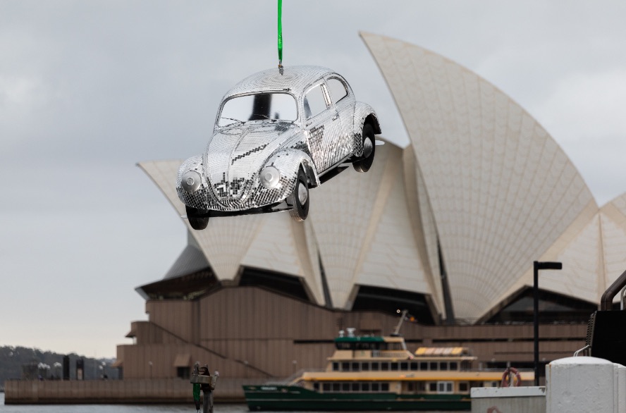 Uber Carshare suspends a giant disco ball car over Sydney Harbour in new stunt via Herd MSL