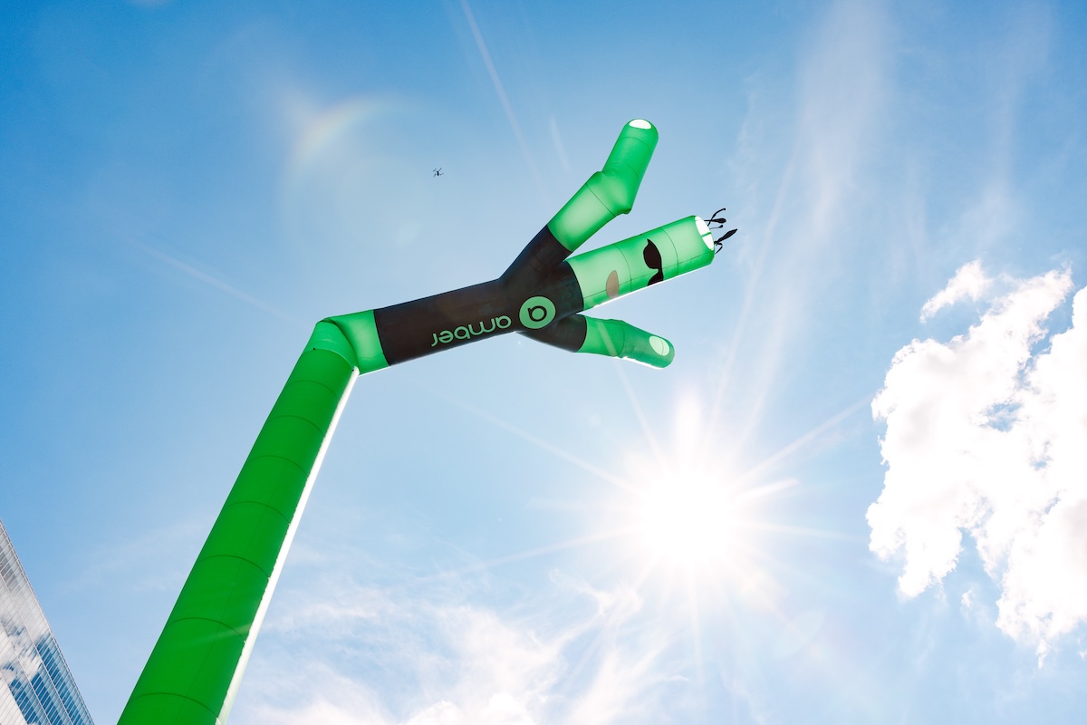 Amberman soars over Melbourne’s CBD to promote a greener, cheaper energy grid