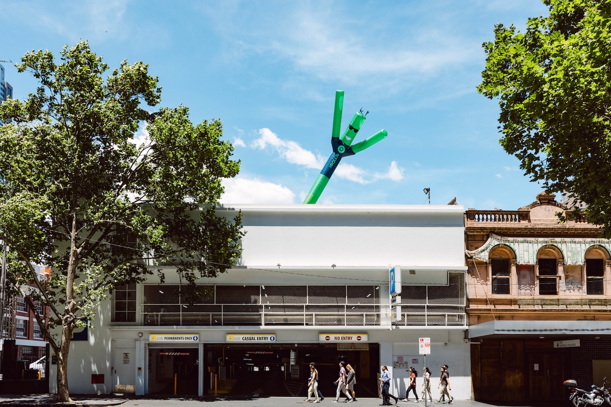 Amberman soars over Melbourne’s CBD to promote a greener, cheaper energy grid