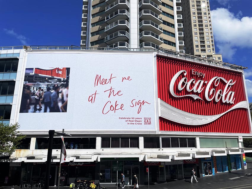 Coca‑Cola’s Iconic Sydney Kings Cross Billboard Celebrates 50 Years with special makeover and a collection of ‘Meet me at the Coke sign’ moments