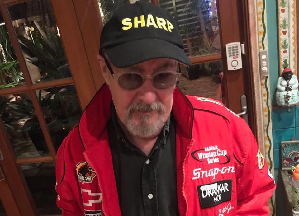 Vale Ray Sharp, brilliant art director, musician + industry character: “The most knowledgeable, funny, and fascinating person I’ll ever know”